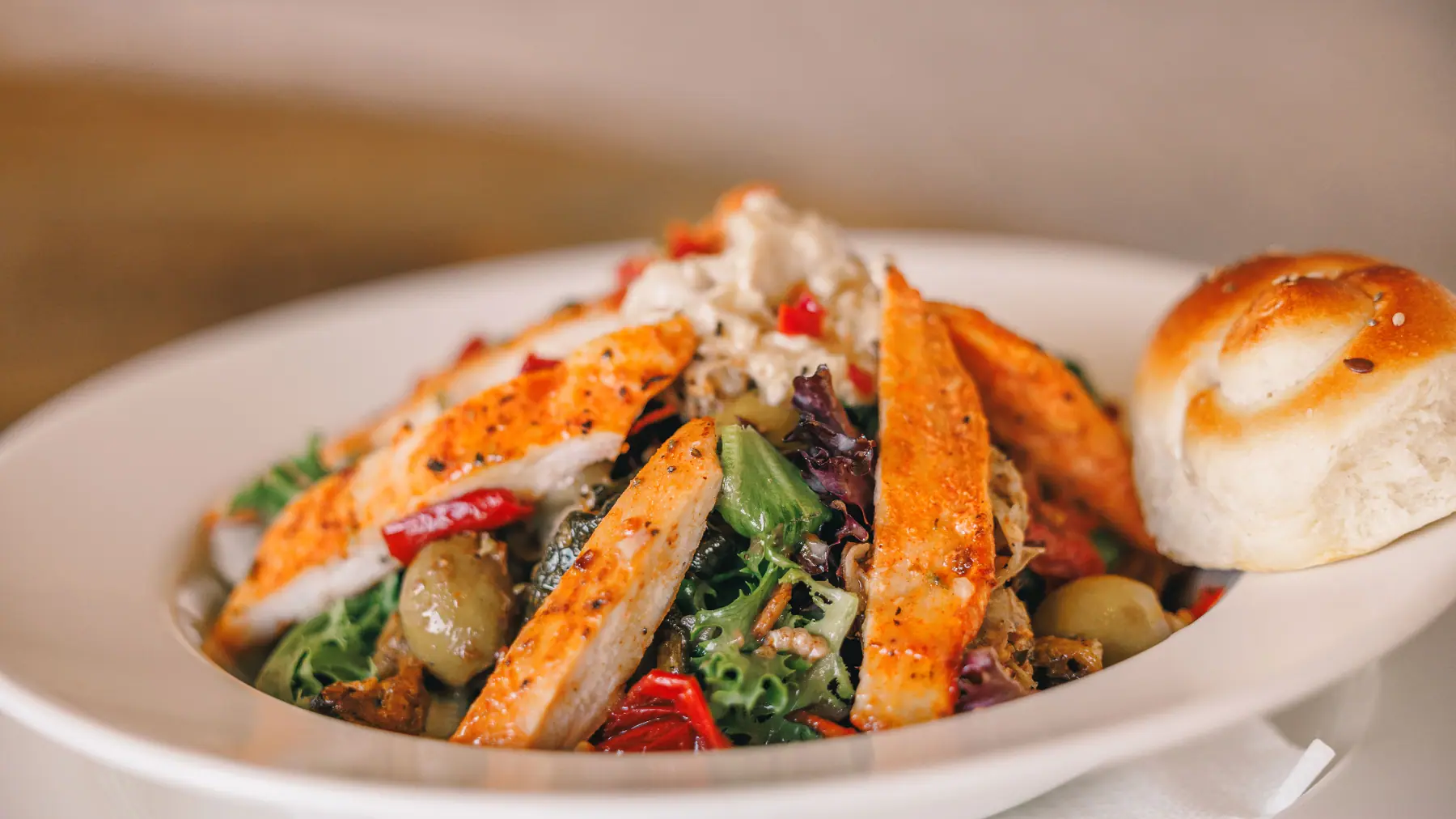 Chargrilled chicken salad served at Enkaji Resort